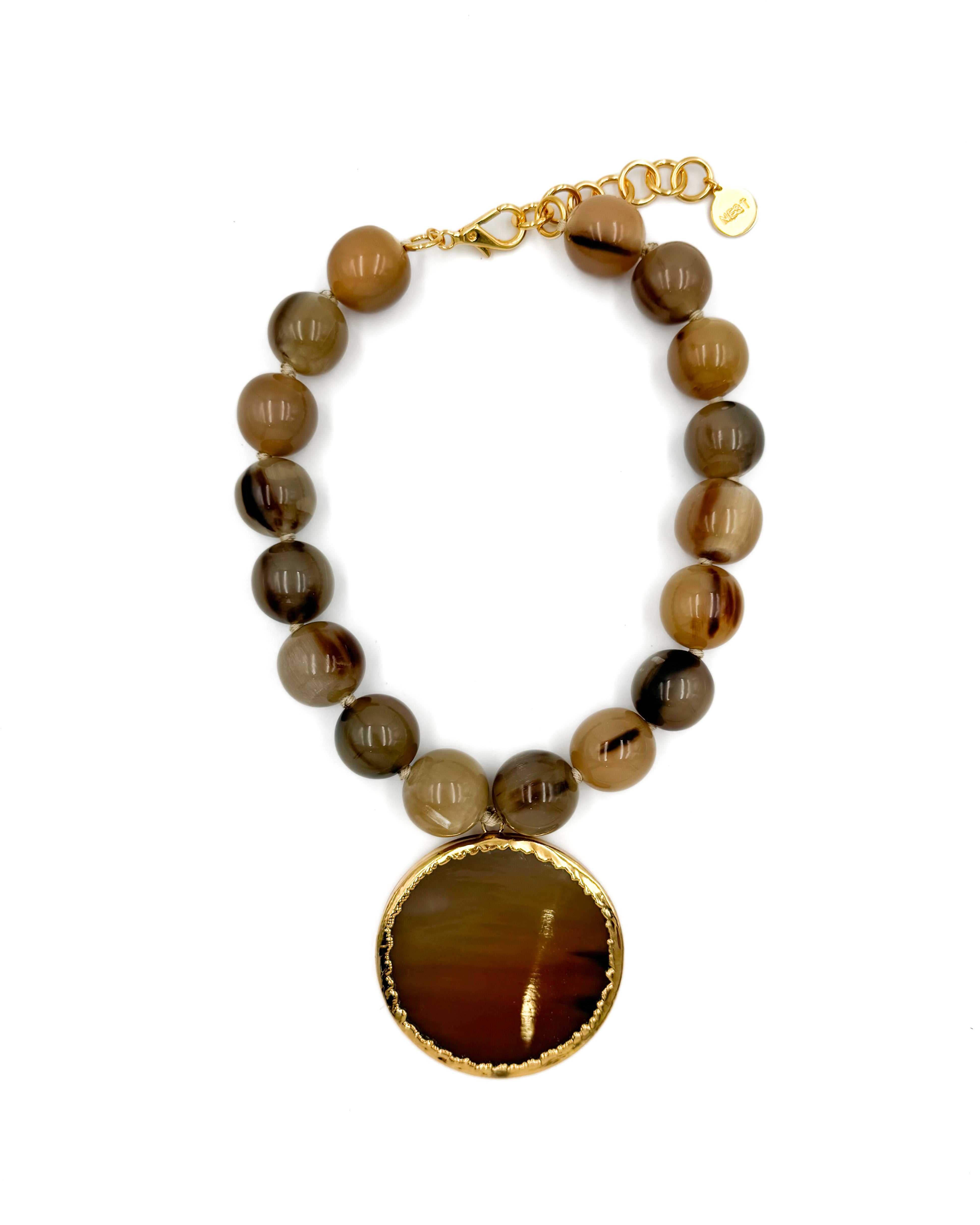 Horn Beaded Necklace with Gold Trimmed Pendant